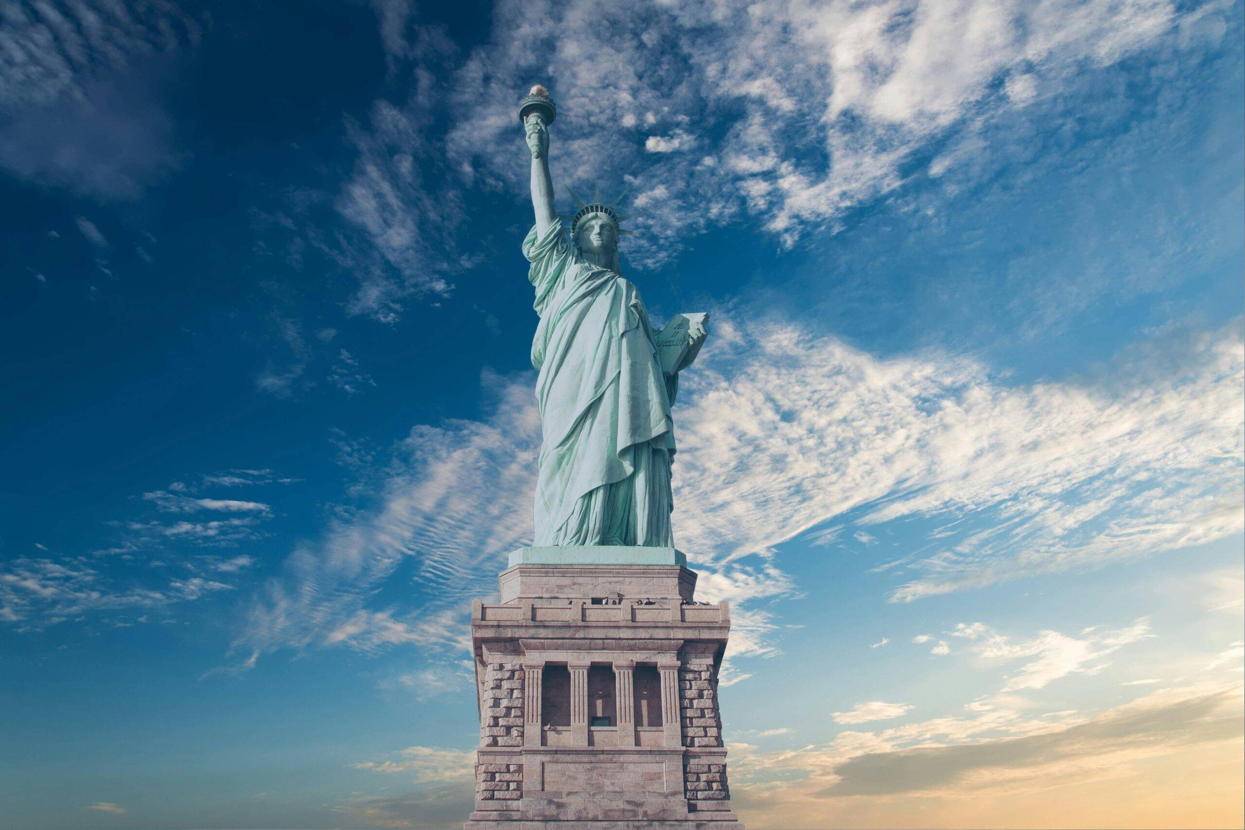 Aerial view of New York Statue of Liberty at sunset — USA group travel destination with Premier DMC